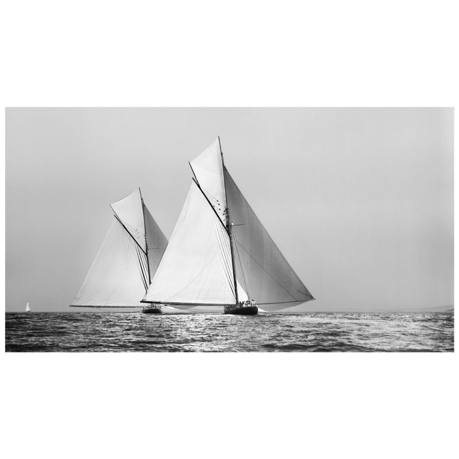 Unframed Black and White, Silver Gelatin, Limited edition Photograph of sailing yacht Shamrock 1 chasing Britannia. Taken by a famous marine photographer Frank Beken in 1899. This photograph was scanned from original glass plate negatives and developed in the dark room as they used to do it period. Available to purchase in deferent sizes from Brett Gallery. Beken of Cowes Framed Prints, Beken of Cowes archives, Beken of Cowes Prints, Beken Archive, Cowes Week old Photographs, Beken Prints, Frank beken of Cowes.